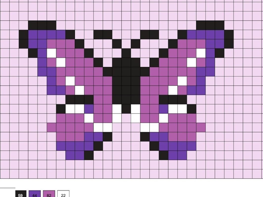 Papillon en perles a repasser aux ailes contrastees
