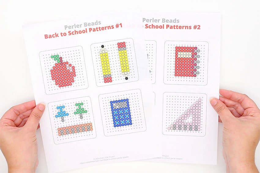 Modeles de fournitures scolaires en perles a repasser : pomme, crayons, regle, calculatrice, cahier, equerre