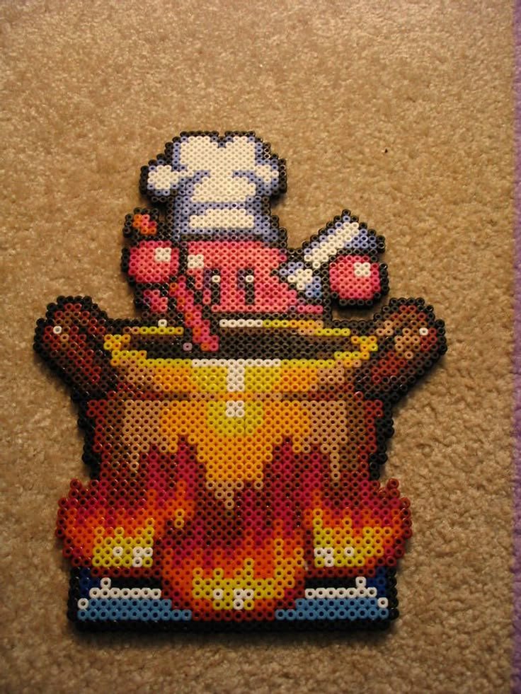 Kirby cuisinier dans sa marmite en perles a repasser