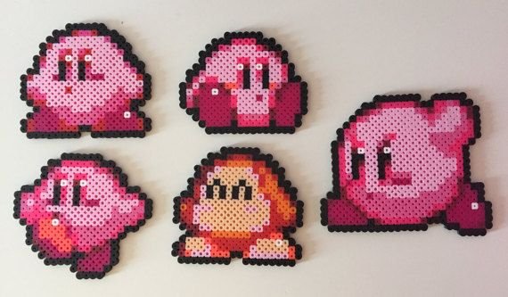Plusieurs Kirby et un Waddle Dee en perles a repasser